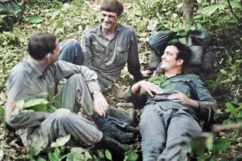 Greg (right) with Australian soldiers in Vietnam
