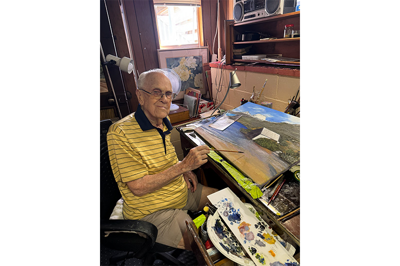 Lloyd Statham with his painting