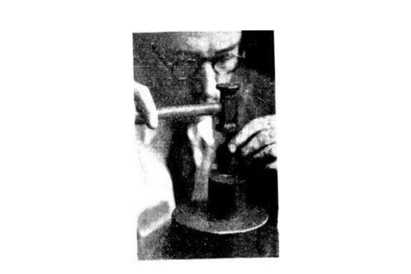 An engraver (or die-sinker) creating the face of a badge (The Telegraph,14 December 1935, 31)