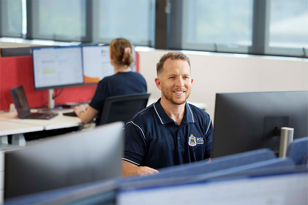 DVA Advocate sitting at computer