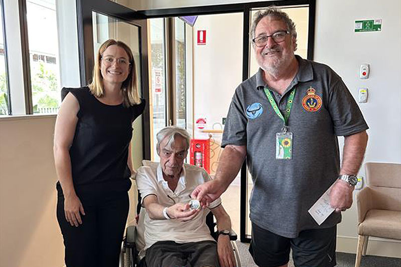Navy veteran Murray Shepherd with RSL Queensland Engagement Officer Hannah Axford (left) and Vice President of the Naval Association of Australia Queensland Branch Ray Sandford (right)