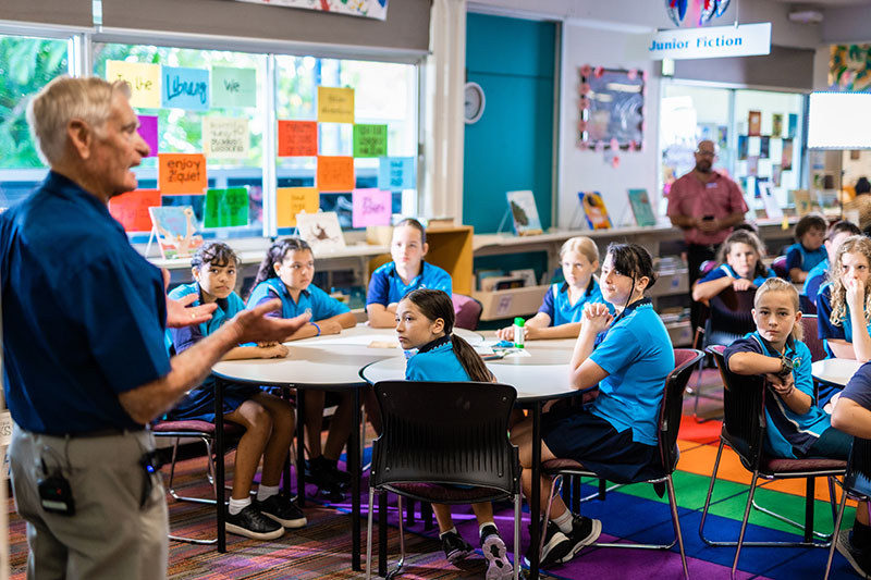 Veteran talking to a classroom