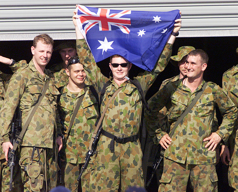 Australian troops prepare to board HMAS Jervis Bay en route to East Timor, September 1999