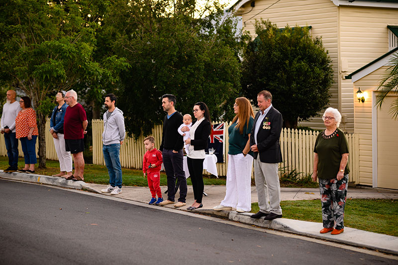 The community of Enoggera participating in ‘Light Up the Dawn’ on ANZAC Day in 2020. Photo by RSL Queensland