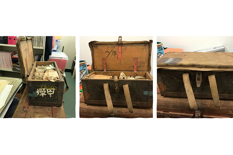 An ammunition box, medical chest and wicker basket