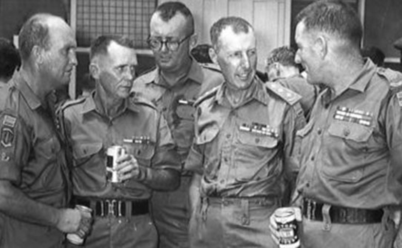 Ray (second from left) with a group of Australian soldiers. 