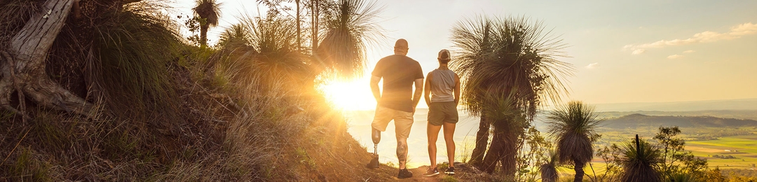 Two veterans hiking and watching the sunrise